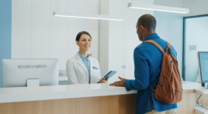 Bright and welcoming urgent care clinic reception, showing easy check-in process.